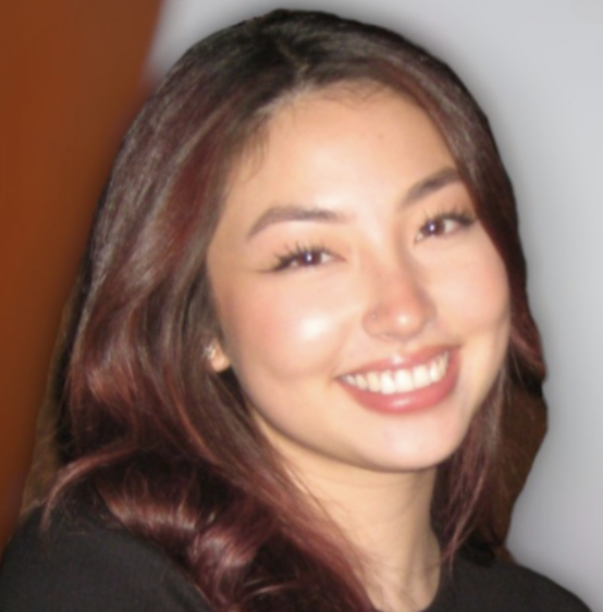 photo of Olivia smiling and looking at camera