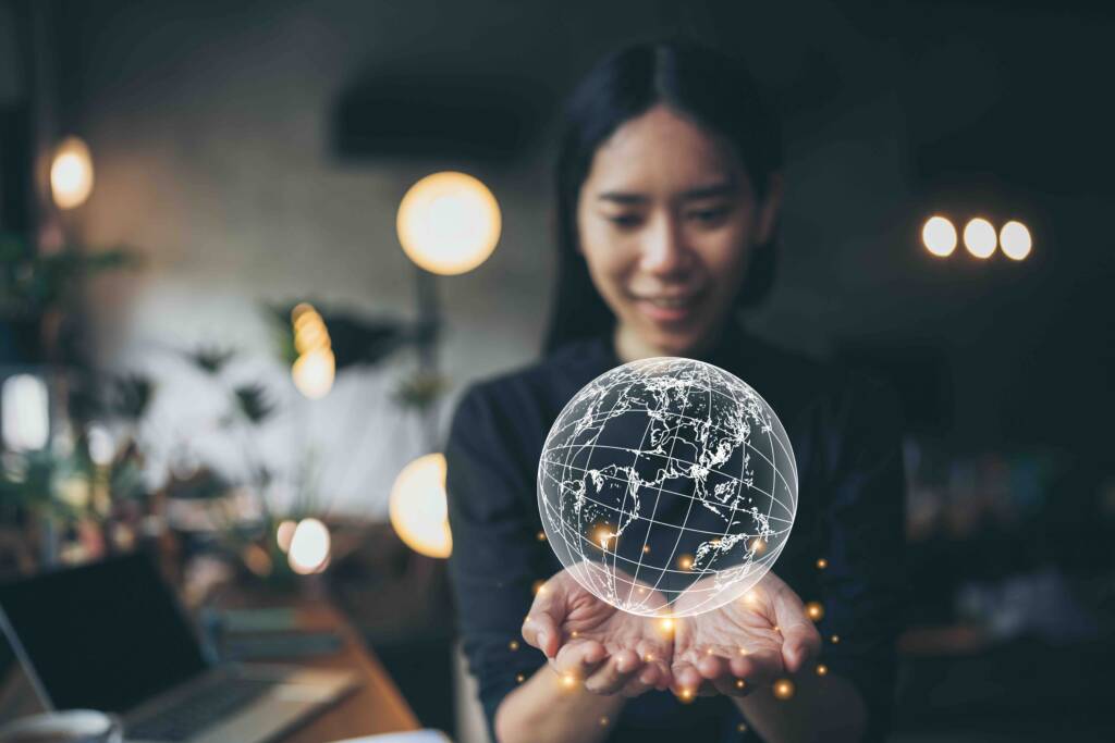 woman holding space globe