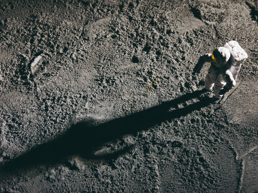 An astronaut on the surface of the moon.