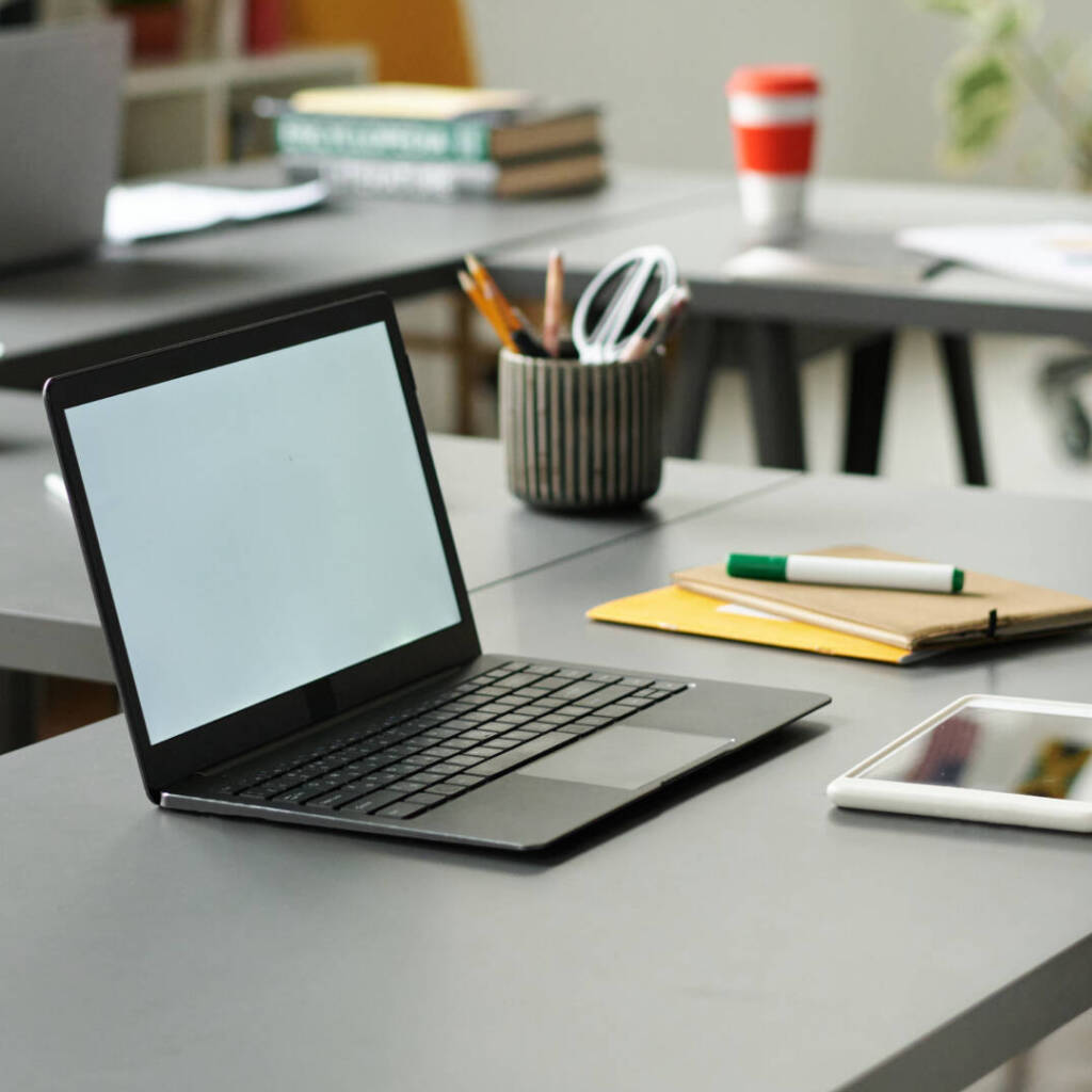 Laptop on desk in the classroom